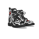 custom Black and white all over print boots with red accents on a white background.